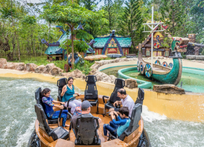 People on a round raft enjoying a water ride