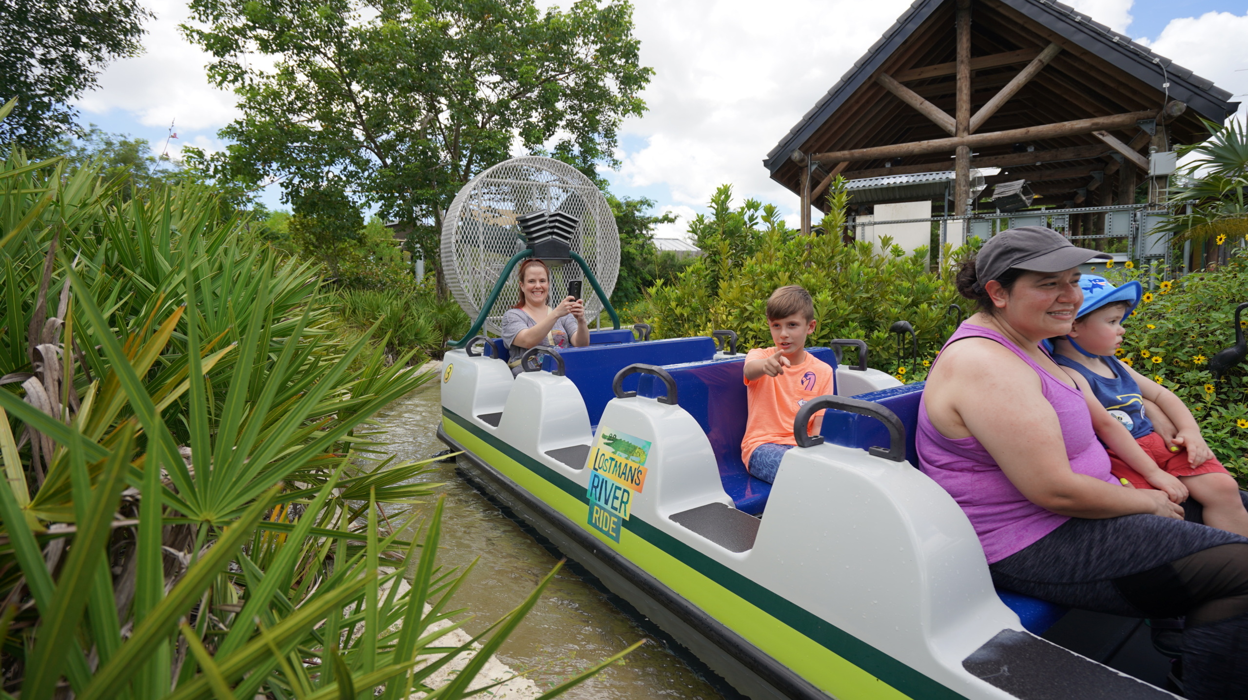 Passengers in water ride boat